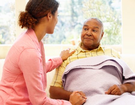 Woman looking after sick father
